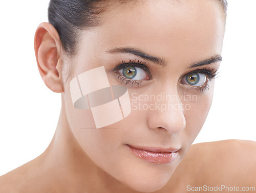 Image of Woman, portrait and eyes with beauty, makeup or cosmetics on a white studio background. Face of young female person, brunette or model in satisfaction for mascara, cosmetology or facial treatment