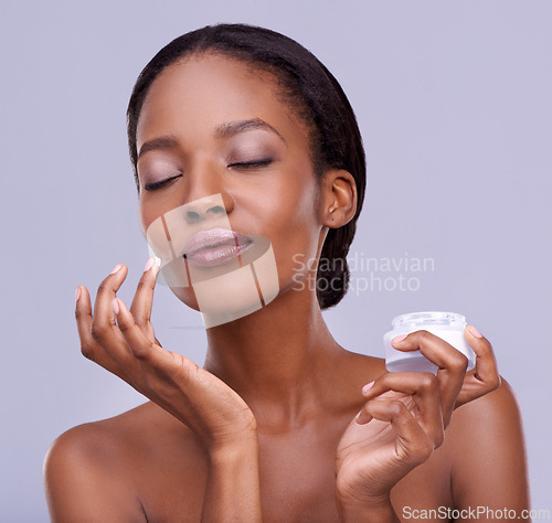 Image of Cream, container and black woman for beauty and dermatology, cosmetic product and shine on white background. Skincare, lotion or sunscreen for moisturizer, antiaging with skin and facial in studio