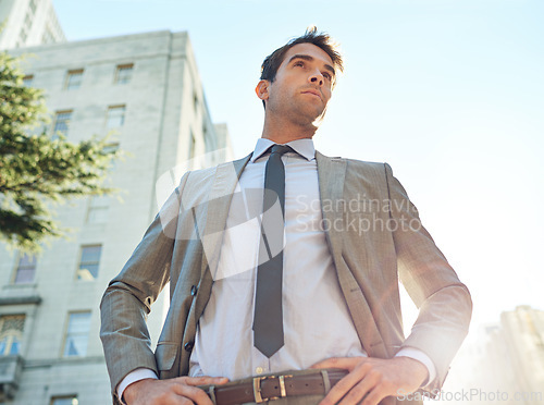 Image of Businessman, city and buildings with thinking for opportunity, career or accounting in Los Angeles. Professional man, vision and entrepreneur with confidence for planning, mindset and ambition