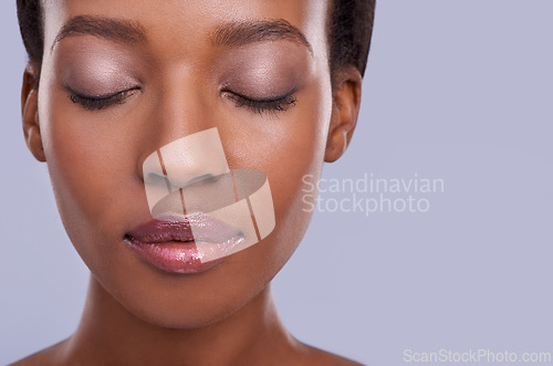 Image of Skincare, face and makeup, black woman with beauty and healthy glow, natural cosmetics for wellness on grey background. Eyeshadow, peace and calm for dermatology, antiaging and mockup space in studio