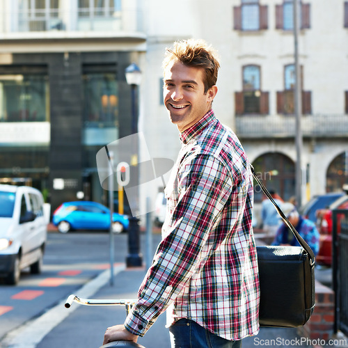 Image of Portrait, happy man and push bicycle in street to travel on eco friendly transport outdoor, commute or walk. Cycling, person and bike in urban town, city and road for journey on sidewalk in Canada