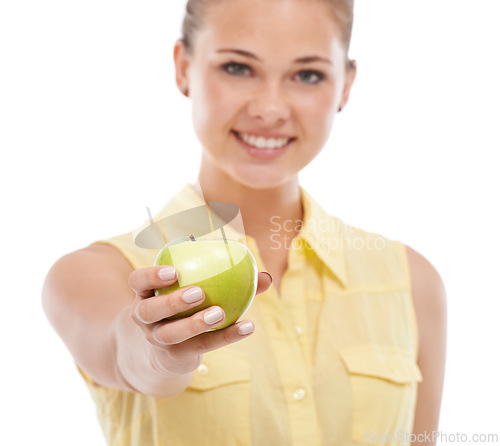 Image of Hand, apple or portrait of happy woman giving a healthy choice isolated on white background. Nutrition vitamins, smile or female person in studio with fruit or offer for fiber, detox diet or wellness
