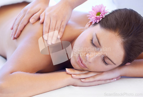 Image of Luxury, massage and woman at spa for health, wellness and relax with calm holistic treatment. Self care, peace and girl on table with masseuse for body therapy, balance and hotel service hospitality.