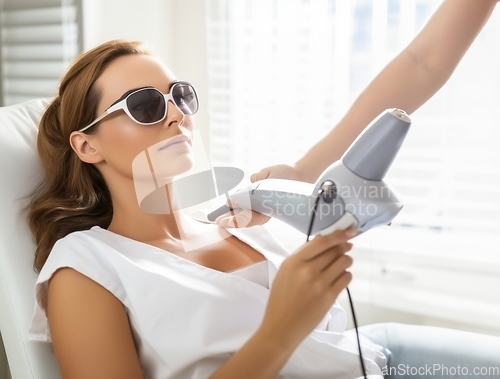 Image of Modern woman undergoes laser hair removal therapy, embracing contemporary beauty techniques for smooth and hair-free skin.