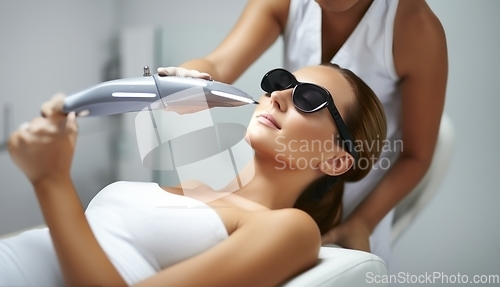 Image of Modern woman undergoes laser hair removal therapy, embracing contemporary beauty techniques for smooth and hair-free skin.