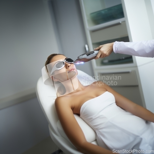 Image of Modern woman undergoes laser hair removal therapy, embracing contemporary beauty techniques for smooth and hair-free skin.