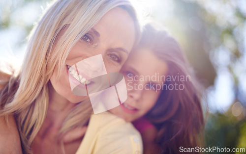 Image of Mother, girl child and portrait outdoor with happiness for bonding, support or hug on holiday in nature. Family, woman and daughter with face, smile or embrace on vacation, travel and love with bokeh