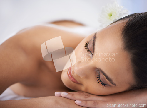 Image of Relax, nap and woman at spa with self care, wellness and luxury skin treatment for zen. Calm, cosmetics and young female person with beauty body routine sleeping on towel at health salon for peace.