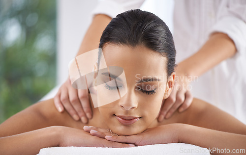 Image of Spa, massage and wellness of a woman, luxury and weekend break with health therapy for zen treatment. Massage therapist hands for body care, relaxing and skin session of a customer feeling calm