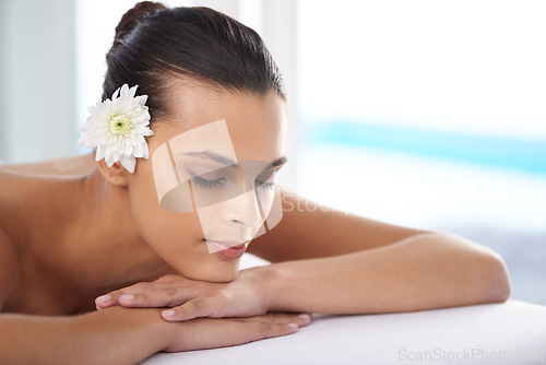 Image of Woman, massage and organic treatment for relaxing, wellness and beauty therapy for body care. Female person, calm and serene or dermatology, cosmetics and resting at resort hotel and peace or zen