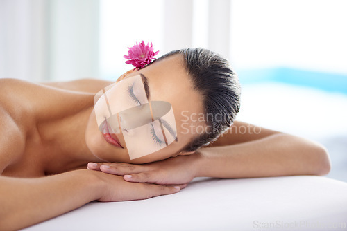 Image of Woman, massage and organic treatment at spa, wellness and beauty therapy for body care. Female person, calm and serene or dermatology, cosmetics and resting at resort hotel and peace or relaxing