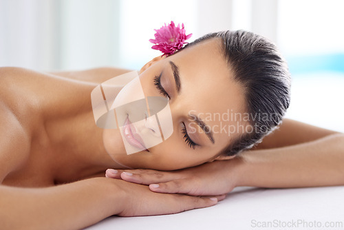 Image of Woman, massage and organic treatment at salon, wellness and beauty therapy for body care. Female person, relaxing and serene or dermatology, cosmetics and resting at resort hotel and peace or zen