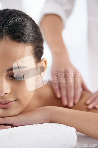 Image of Relax, woman and hands massage shoulder for skincare, beauty and pampering body for wellness at luxury salon. Therapist, table and person at spa for treatment, peace and calm for health with masseuse