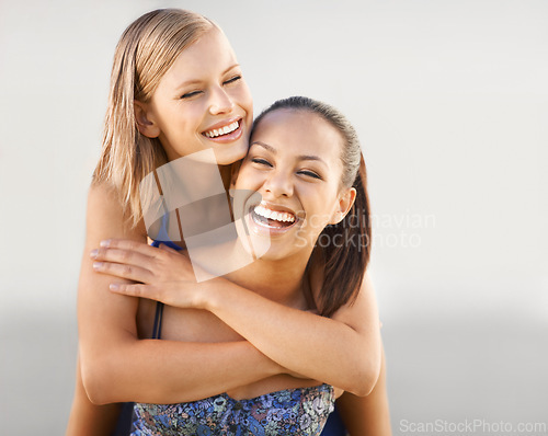 Image of Friends, women and happy with piggyback in studio for bonding, relax or vacation in summer with swimwear. People, embrace and support with mock up space for holiday and adventure on white background
