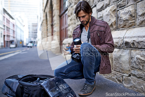 Image of Camera lens, equipment and photographer in city for photoshoot with gear on street. Cameraman, cleaning and prepare professional photography tools for project and person with technology on road