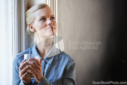 Image of Thinking, memory and woman with coffee in house dreaming, idea or moment of reflection on wall background. Remember, curious and female person at home with tea, break or me time on day off or weekend