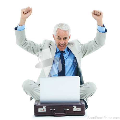 Image of Studio, laptop and mature businessman with success, celebrating and happy for online deal or winning. Senior entrepreneur, computer and fist pump for profit and excited for bonus by white background