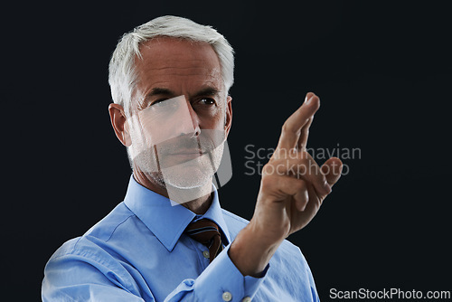 Image of Business man, finger and future interface for choice isolated on a black studio background. Touch, professional and hand gesture on screen, click button and innovation of technology for senior CEO