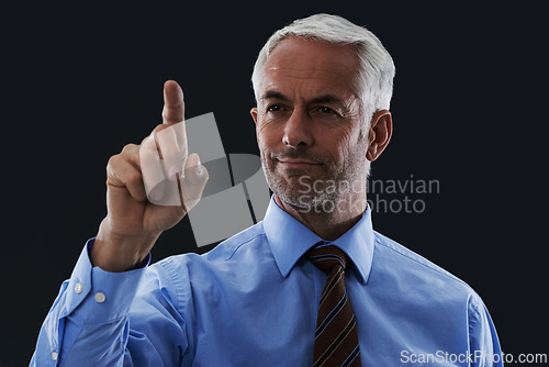 Image of Business man, finger and digital interface for choice isolated on a black studio background. Touch, professional and hand gesture on screen, click button and future innovation of tech for senior CEO