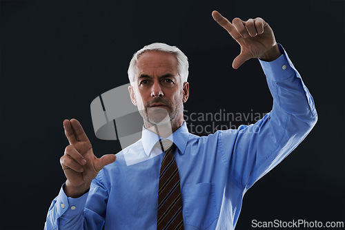 Image of Business man, hands and digital interface isolated on a black studio background. Touch, professional and finger gesture on screen, face and future innovation of technology for serious senior CEO