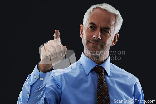 Image of Business man, finger or click interface for choice isolated on black studio background. Touch, professional or hand gesture on screen, press button or future innovation of digital tech for senior CEO