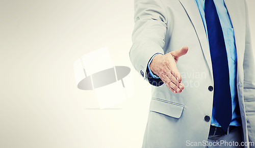 Image of Businessperson, handshake and gesture for agreement or deal for hiring or partnership, welcome or onboarding. Person, fingers and mockup space or white background for greeting, studio or professional