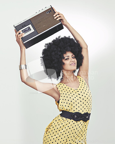 Image of Fashion, black woman and smile in studio with radio, afro and grey background in vintage and happy. Colourful, retro and outfit for fashionista with old school look, style and trends with confidence
