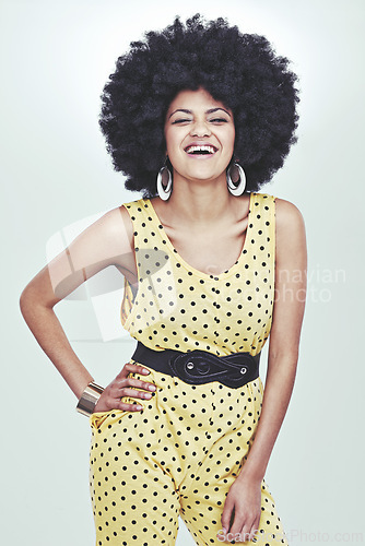 Image of Portrait, woman and fashion in studio with smile, white background and confident in colourful outfit for summer look. Afro, style and elegance with casual look in glamour, accessories and happy