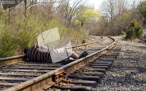 Image of Laying on the Rails