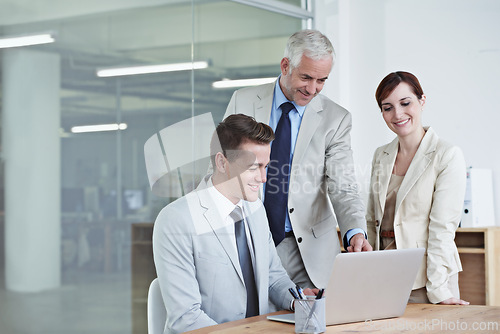 Image of Laptop, meeting and business people in office for research on corporate legal project in collaboration. Team, technology and group of attorneys work on law case with computer in workplace boardroom.