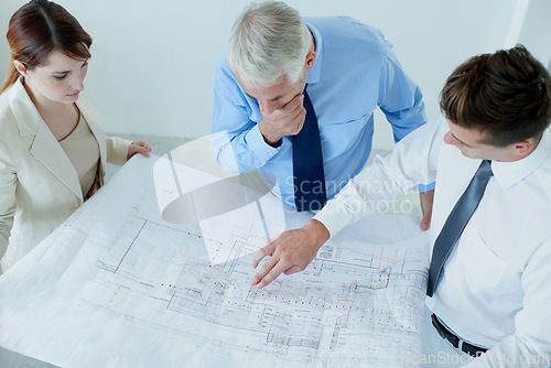 Image of Blueprint, architecture or top view of team planning project, maintenance or renovation in meeting. Civil engineering, people building or group of designers with floor plan for property development