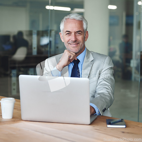 Image of Senior, businessman and expert for laptop, portrait and desk in office for consultation. CEO, man and plan for workspace, boss and human resources at professional company for startup with suit