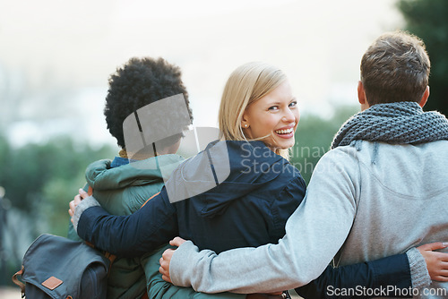 Image of College, friends and portrait with hug or smile for bonding, relax and break on campus with diversity. University, people and happy with embrace for support, education and learning fun with rear view