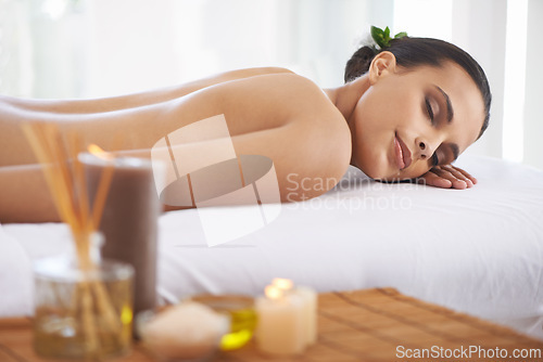 Image of Relax, peace and woman at spa for massage, skincare or calm at table to rest for aromatherapy at luxury resort. Beauty, therapy and person at salon for healthy body, treatment or pamper for wellness