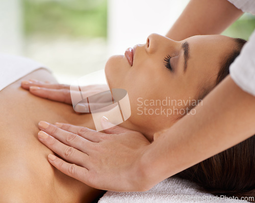 Image of Woman, relax and body massage in spa for rest, wellness and peace with sleeping of healing hands. Person, comfort and masseuse for health treatment with zen, calm and detox on bed in holiday resort