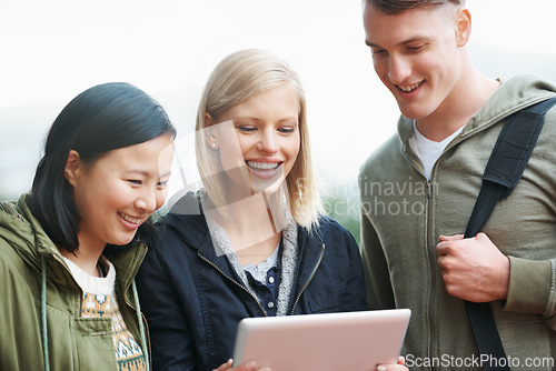 Image of University, friends and happy with tablet outdoor for research, relax or break on campus with social media. College, people and smile with technology for internet, streaming or learning and diversity