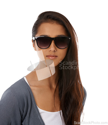 Image of Woman, sunglasses and cool fashion in studio, casual style and trendy outfit on white background. Female person, shades and lovely eyewear on backdrop, confidence and pride for designer accessories