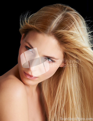 Image of Wind, hair care and skincare of woman, beauty and thinking isolated on a black studio background. Hairstyle, makeup and blonde model in breeze, hairdresser and salon for facial treatment cosmetics