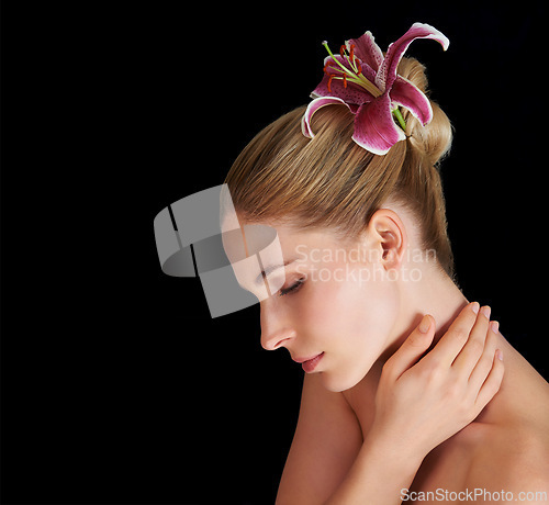 Image of Hair, flower and beauty of woman with eyes closed for skincare isolated on black studio background mockup. Natural, floral makeup and hairstyle of model in cosmetics, lily or organic facial treatment