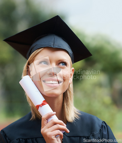 Image of University graduation, campus or woman thinking of education, future goals and studying for opportunity. College graduate dream in nature for award, certified achievement or scholarship for knowledge