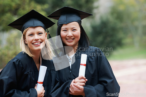 Image of Graduation, campus or portrait of women with education, future goal or studying for opportunity. Friends, smile or happy college graduate with success, certified achievement or university scholarship