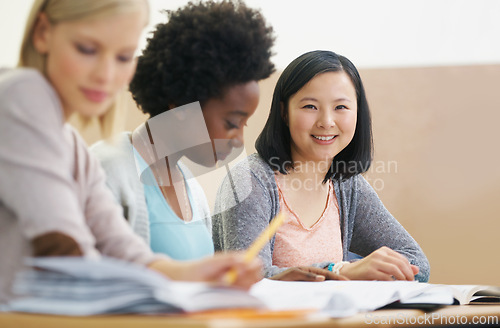 Image of Student, university and woman in classroom portrait, information and notes for test. Female person, books and knowledge in education for learning, problem solving and idea for solution in assessment