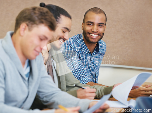 Image of Student, college and man in classroom portrait, information and notes for studying. People, assignment and knowledge in education for learning, problem solving and ideas for solution in assessment