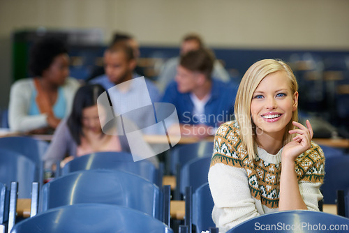 Image of University, students and happy portrait in classroom and learning in course lecture for education. College, campus and people studying for test in school and reading project, research or knowledge