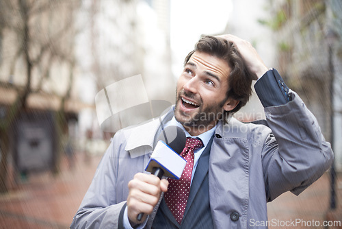 Image of Weather, man and reporting on rainstorm, smile and journalism with media and breaking news. Feedback, person and employee with a microphone or professional in New York city with information or anchor