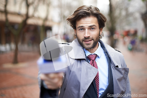 Image of Microphone, city and interview with man, reporting and live streaming with broadcast and journalism. Portrait, person and employee with questions and feedback with breaking news and mic with opinion