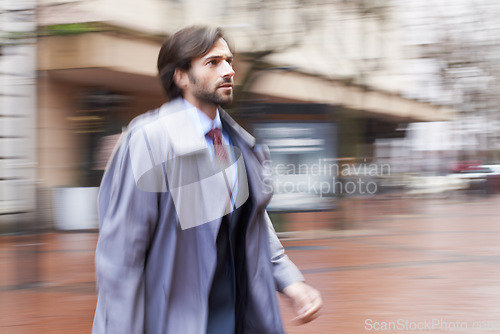 Image of Businessman, hurry and street in city for work in corporate company, late for meeting and overcoat. Executive, outdoor and rush in town in blur to be professional for New York office and stress