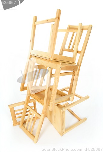 Image of Stacked wooden chairs