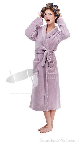 Image of Hair, morning and bathrobe with woman curling in studio isolated on white background for pampering. Wellness, beauty and cosmetics with young person in bathroom to relax for haircare treatment