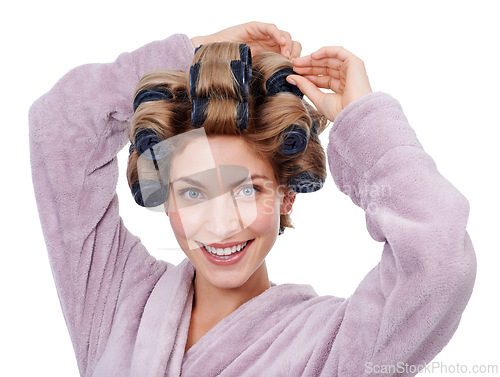 Image of Portrait, hair and woman with curlers for haircare, routine and smiling in studio for hairstyle. Female person, cosmetic treatment and rollers for grooming, white background and tools for beauty